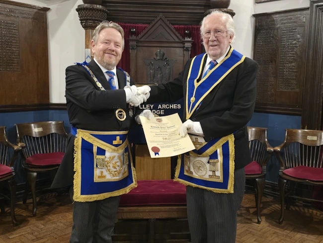 Peter Hollins 50 years a Freemason with the APGM David McGurty